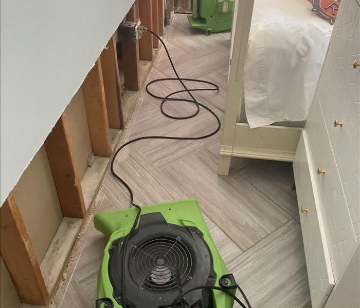 Water damaged house, drywall cut out up to 5 inches and drying equipment placed in precise drying location